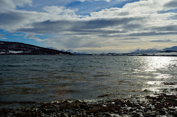 Fototapeta na wymiar snowy mountain and fjord landscape
