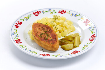 cutlet with mashed potato on white plate