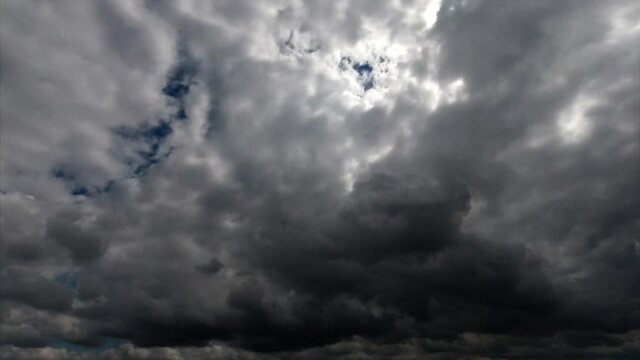 Rainy clouds on sky. Thunderstorm dramatic clouds. 4K Time lapse 