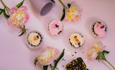 Pink peonies, cream cakes and flower tea