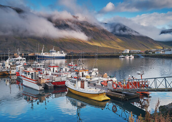 Bolungarvik, Iceland / Iceland - september 2018: Fishing boats in the harbor of Bolungarvik, Iceland.