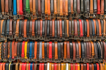 Italian leather belts in Florence market, Italy