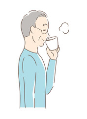 マグカップのコーヒーを飲む男性の横顔