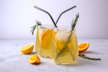 Two refreshing cocktails with metal straws