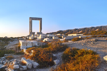 Fototapeta na wymiar ancient Portara or the Great Door at Naxos island Greece - Temple of Apollo 