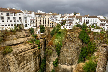 Fototapeta na wymiar Scenic sight of Ronda with white houses built on high cliffs, Andalusia, Spain.