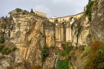 Fototapeta premium Puente Nuevo in Ronda, Spain spans the 120m deep chasm which divides the city.