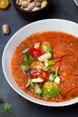 Spanish cold tomato soup gazpacho with Basil