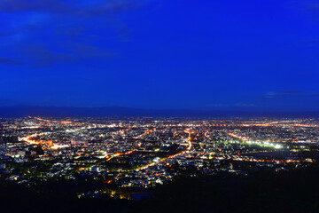 Fototapeta na wymiar Photograph of Chiang Mai city in evening time with twilight and blue sky