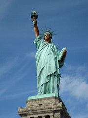 Fototapeta premium The statue of Libery in New York represented as afro american. Concept for integration, tolerance and brotherhood and concept against racism, inolterance and discrimination