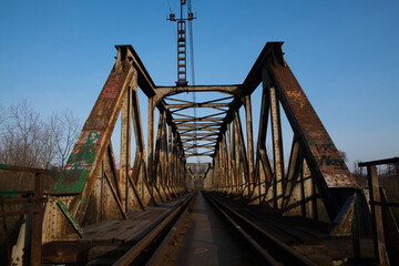 Fototapeta na wymiar Old railway bridge during sunny day, Nowy Sacz, Malopolskie, Poland.