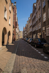 Gdansk, Poland - Juny, 2019:. Beautiful multi-colored houses in the old town in Gdansk. The central streets of the historic center of Gdansk. The main tourist attraction of Gdansk.