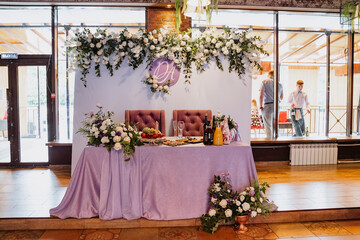 wedding decor, decoration for newlyweds, holiday decoration with flowers, holiday table, photo zone, Banquet hall, celebration, boho style
