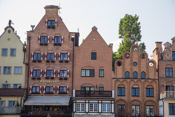 Gdansk, Poland - Juny, 2019: Motlawa river with old town architecture background in Gdansk, Poland