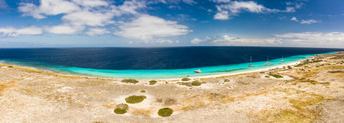 Aerial view of coast of Klein Curacao in the Caribbean Sea with turquoise water, cliff, beach and...