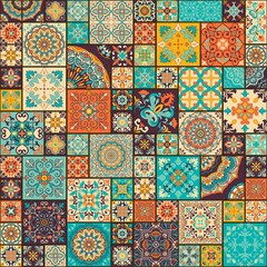 Fototapeta na wymiar Seamless colorful patchwork tile with Islam, Arabic, Indian, ottoman motifs. Majolica pottery tile. Portuguese and Spain decor. Ceramic tile in talavera style. Vector illustration
