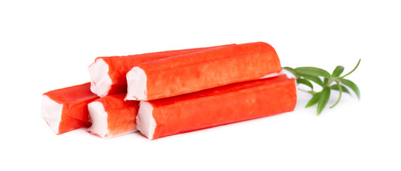 Crab stick isolated on white background. Imitation crab meat with rosemary sprig. Fish product. © vandycandy
