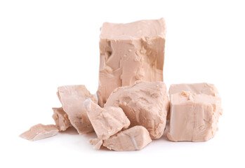 Fresh pressed yeast, isolated on white background. Compressed fresh yeast block.