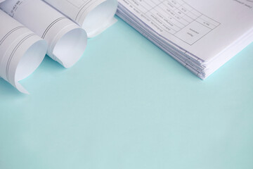 Stack Folding drawings on a blue background. Top view. Flat lay. Copy space. Technical project drawing.