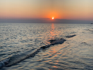 Shots of the sunset on the seashore. The Mediterranean in Turkey.