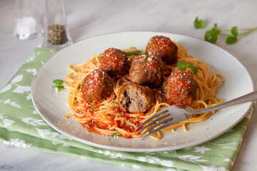 Spaghetti pasta with meatballs and tomato sauce