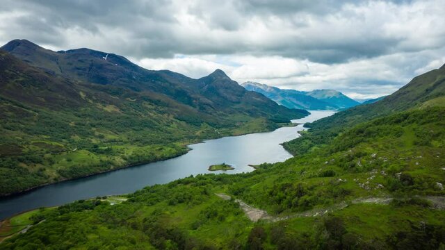 aerial footage of loch leven and the pap of glencoe shot on the west highland way near kinlochleven in the argyll region of the highlands of scotland in summer