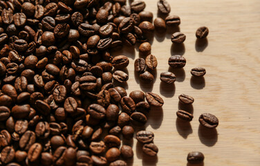 roasted coffee beans on wooden background