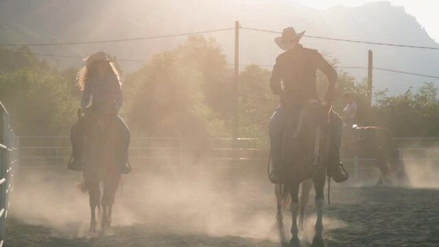 WS Woman and man horseback riding in paddock / Primaluna, Lecco, Italy