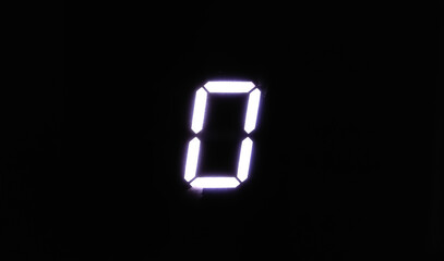 Number 0 (zero), seven segment digital led display   isolated against a black background. Copy...