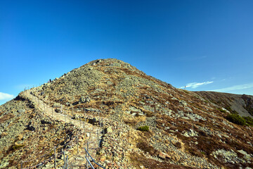Rocky peak Sniezka on a clear autumn day in the Giant Mountains in Poland..