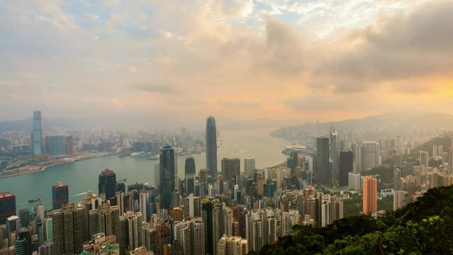 WS T/L ZO Hong Kong Central skyline and traffic in Victoria Harbour seen from The Peak / Hong Kong, China