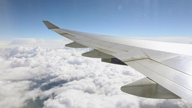 WS POV Airplane view on cloudy sky / Chicago, Illinois, USA