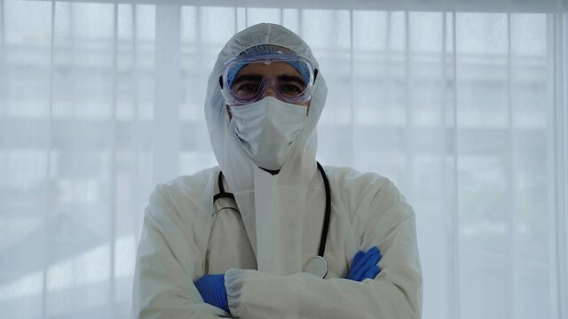 In an epidemic situation covid 19, Arab doctors in germ-resistant clothes are wearing masks.
