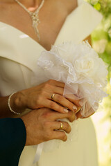 hands of bride and groom
