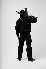 police special forces officer in black uniform isolated on white