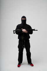 police special forces officer in black uniform isolated on white