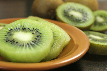fresh kiwi fruit on a plate