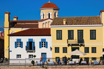 Greece, Athens, Plaka district, traditional houses with orthodox church in the background, February 4 2020.