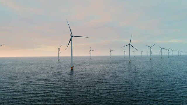 WS POV Wind turbines in sea and on land / Urk, Flevoland, Netherlands