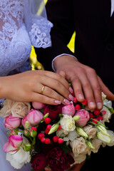 bride and groom holding hands