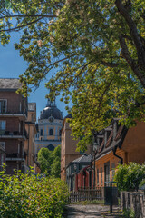 Old houses in Stockholm. Sodermalm district. Sweden. Scandinavia. View with Katarina kyrka (Church of Catherine).