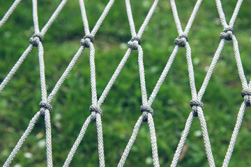 hammock texture closeup, weaving rope into knots on a background