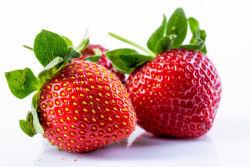 Close up  Strawberry with green leaves  on white background