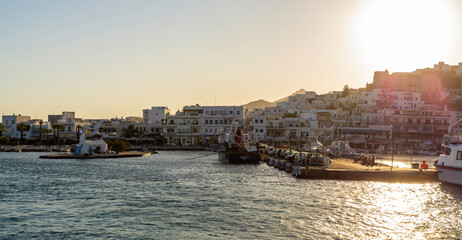 Views of the fishing port of Naxos with the Panagia Mytidiotissa church on its islet, protecting sailors from entering the sea, Naxos, Naxos Island, Cyclades, Greece