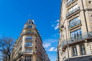 Paris, typical facade and street, beautiful building near Montmartre
