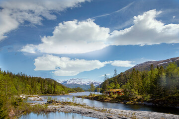 Fototapeta na wymiar On the banks of the river in great Velfjord nature, Northern Norway