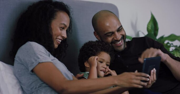 MS Family with son (2-3) having video conference on tablet / Claremont, Cape Town, South Africa