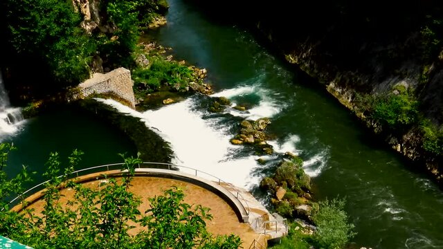 Aerial view over estuary of two fast mountain rivers during spring day.