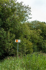 Warning signs for fishermen on Harthill reservoir, Sheffield, U.K.