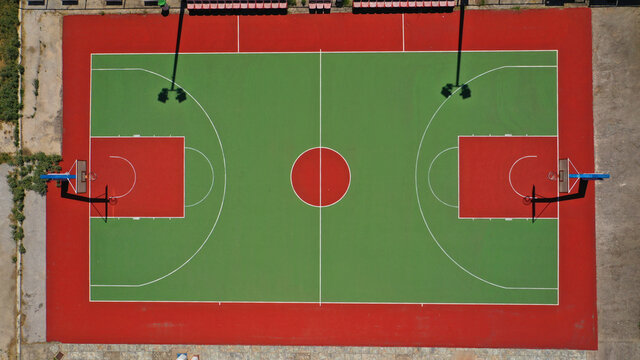 Aerial drone top down photo of empty basket ball court